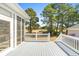 Well-maintained deck with views of the manicured golf course and blue skies at 598 Summer Green Ct., Sunset Beach, NC 28468