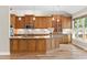 Large kitchen with granite countertops, stainless steel appliances and wood cabinets at 598 Summer Green Ct., Sunset Beach, NC 28468