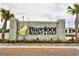 Barefoot Resort & Golf entrance sign with lush landscaping and palm trees at 6203 Catalina Dr. # 1811, North Myrtle Beach, SC 29582