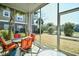 Covered patio showcasing outdoor seating, with a view of the complex and the golf course at 6203 Catalina Dr. # 1811, North Myrtle Beach, SC 29582