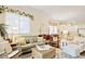 Comfortable living room featuring neutral tones and plenty of natural light at 63 Mckissick Dr. # 2B, Pawleys Island, SC 29585