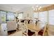 Bright living room, dining area, and slider to outside deck at 63 Mckissick Dr. # 2B, Pawleys Island, SC 29585