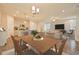 Open-concept dining area with stylish lighting, seamlessly connected to the living room and kitchen at 67 Bridgeview Rd., Georgetown, SC 29440