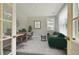 Functional home office space with desk, seating, and natural light, accessed via french doors at 67 Bridgeview Rd., Georgetown, SC 29440