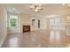 Bright living room with fireplace and abundant natural light streaming through the windows at 67 Bridgeview Rd., Georgetown, SC 29440