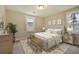Stylishly furnished main bedroom with seating area, accent rug and decor at 67 Bridgeview Rd., Georgetown, SC 29440