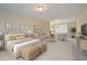 Comfortable main bedroom featuring a seating area and calming decor at 67 Bridgeview Rd., Georgetown, SC 29440