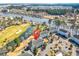 A beautiful aerial view of lakeside condos with private parking in an attractive community at 699 Riverwalk Dr. # 202, Myrtle Beach, SC 29579