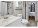 A bright bathroom featuring a modern sink with vanity, leading into the bedroom at 699 Riverwalk Dr. # 202, Myrtle Beach, SC 29579