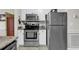 Modern kitchen featuring stainless steel appliances and ample cabinet space for storage at 699 Riverwalk Dr. # 202, Myrtle Beach, SC 29579