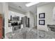 Kitchen featuring granite countertops, white cabinets, and modern appliances at 699 Riverwalk Dr. # 202, Myrtle Beach, SC 29579