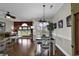 Open living area with dining space, hardwood floors, and a scenic view to the outdoors at 699 Riverwalk Dr. # 202, Myrtle Beach, SC 29579