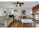 Cozy living room featuring hardwood floors, ample seating, and stylish decor at 699 Riverwalk Dr. # 202, Myrtle Beach, SC 29579