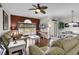 Inviting living room and dining area with sliding glass doors and lots of natural light at 699 Riverwalk Dr. # 202, Myrtle Beach, SC 29579