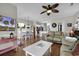 Inviting living room, dining area, and kitchen with hardwood floors and neutral paint colors at 699 Riverwalk Dr. # 202, Myrtle Beach, SC 29579
