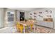Bright dining area features stylish decor, a chalkboard wall, wood table and six chairs at 7071 Shooting Star Way, Myrtle Beach, SC 29579