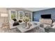 Comfortable living room filled with natural light and stylish furniture and decorations at 7071 Shooting Star Way, Myrtle Beach, SC 29579