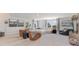 Spacious living room with a large sectional sofa, accent chairs, and a cozy entertainment setup at 7071 Shooting Star Way, Myrtle Beach, SC 29579