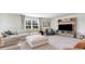 Comfortable living room featuring a sectional sofa, media center, and a cozy seating area at 7071 Shooting Star Way, Myrtle Beach, SC 29579