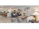 Open concept living room showcasing an adjacent kitchen, stylish furniture, and a bright atmosphere at 7071 Shooting Star Way, Myrtle Beach, SC 29579