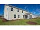 Two-story home with a screened in porch and large backyard, perfect for outdoor activities at 7079 Shooting Star Way, Myrtle Beach, SC 29579