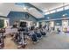 Bright fitness center with large windows, ceiling fans, and a variety of modern exercise equipment at 7079 Shooting Star Way, Myrtle Beach, SC 29579