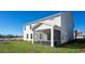 A spacious screened porch on a home with a large yard for outdoor living and entertaining at 7079 Shooting Star Way, Myrtle Beach, SC 29579