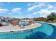 Large swimming pool area with decorative water features, landscaping, and lounge areas for residents at 7079 Shooting Star Way, Myrtle Beach, SC 29579