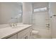 Bathroom featuring a single sink vanity and a shower-tub combo at 82 Bridgeview Rd., Georgetown, SC 29440