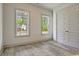 Bedroom featuring light gray floors and a double door closet at 82 Bridgeview Rd., Georgetown, SC 29440