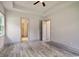 Bedroom with tray ceiling and an ensuite bathroom at 82 Bridgeview Rd., Georgetown, SC 29440