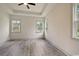 Bright bedroom with tray ceiling, recessed lighting, and lots of natural light at 82 Bridgeview Rd., Georgetown, SC 29440