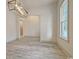 Dining room featuring light gray floors and modern light fixture at 82 Bridgeview Rd., Georgetown, SC 29440