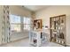 Bright home office space with large windows and ample storage featuring a light color scheme at 929 Maya Layne Dr., Little River, SC 29566