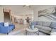 Open-concept living space connecting to the kitchen, featuring stylish decor and ample natural light at 929 Maya Layne Dr., Little River, SC 29566