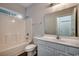 Clean bathroom features a shower-tub combo and a white vanity at 999 Algonquin Dr. # E, Pawleys Island, SC 29585