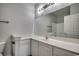 Bathroom boasts white vanity, large mirror, and access to shower and toilet at 999 Algonquin Dr. # E, Pawleys Island, SC 29585
