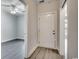 Inviting hallway leads to a bright room, showcasing the home's open layout and clean design at 999 Algonquin Dr. # E, Pawleys Island, SC 29585