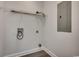 Bare laundry room with hookups and built-in shelving at 999 Algonquin Dr. # E, Pawleys Island, SC 29585