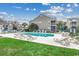 Community pool with plenty of lounge chairs at 999 Algonquin Dr. # E, Pawleys Island, SC 29585