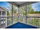 Screened-in porch offers an excellent space for outdoor relaxation at 999 Algonquin Dr. # E, Pawleys Island, SC 29585
