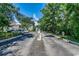 Community street lined with trees at 999 Algonquin Dr. # E, Pawleys Island, SC 29585