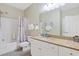 Bathroom with granite counters, white cabinets, and a shower/tub combination at 1009 World Tour Blvd. # 103, Myrtle Beach, SC 29579