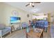 Cozy open-concept living room featuring eat-in kitchen and comfortable seating at 1009 World Tour Blvd. # 103, Myrtle Beach, SC 29579