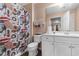 Bathroom featuring a single vanity with a white cabinet and fashion print shower curtain at 117 Butkus Dr. # 1, Myrtle Beach, SC 29588