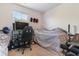 Neutral bedroom with a black gaming chair, wall decor and natural light at 117 Butkus Dr. # 1, Myrtle Beach, SC 29588