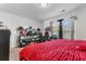 Spacious bedroom with a bright window, neutral walls, and red accents at 117 Butkus Dr. # 1, Myrtle Beach, SC 29588