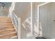 Exterior view of stairway leading to a tan door and siding at 117 Butkus Dr. # 1, Myrtle Beach, SC 29588