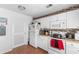 Well-lit kitchen with white cabinets, appliances, and convenient layout at 117 Butkus Dr. # 1, Myrtle Beach, SC 29588