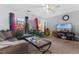 Comfortable living room featuring a large sectional couch and sliding glass doors to outdoor at 117 Butkus Dr. # 1, Myrtle Beach, SC 29588